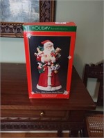 Ceramic musical Santa vintage in original box.