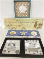 Collection of beach themed home decor signs