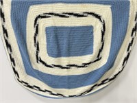 Light blue black and white crocheted lap blanket