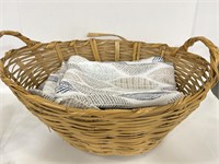 Wicker basket full of two types of fabric curtains