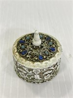 Small decorative metal trinket jar