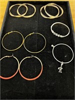 6 bracelets 2 large hoop earrings