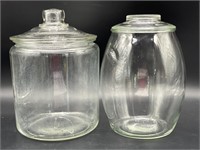 (2) Glass Lidded Jars 9.75” (one on left has