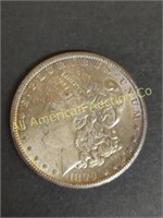 1899-O MORGAN SILVER DOLLAR