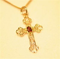 9ct Filigree Cross With A Garnet