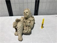 Concrete Wall Hanging of Old Woman