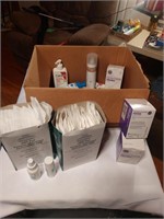 Large box of medical bandages lotions aloe and