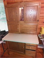 Hoosier cabinet really good shape with Flower
