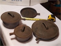 4 cast iron pieces with three lids no handle