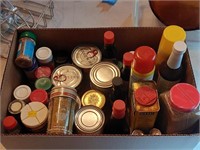 Large box of spices and some canned food some out