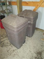 two garbage cans with birdseed
