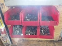 six red bins with bolts, washers, more