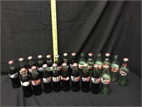 Group of Various COCA COLA Soda Bottles