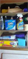 Contents of cabinet lots of cleaning supplies