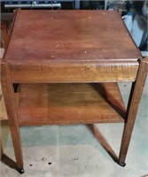 Rolling side table approx size is 21 inches