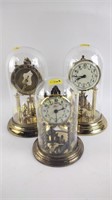 (3) Anniversary clocks, some incomplete,