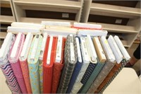 box w/bolts of fabric & pattern books