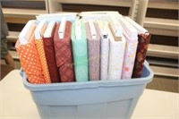 Tote w/bolts of fabric & pattern books