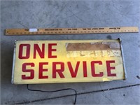 Old light up one service sign