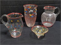 Group of glass pitchers, vase, etc. Largest: 8"h