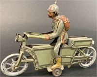 a/ MEIER MILITARY MOTORCYCLE PENNY TOY