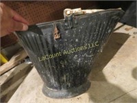 vintage coal bucket and gas can rope