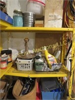 misc garage items on shelf sprinkler