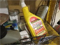 misc garage items on shelf sprinkler