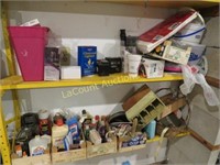 all misc garage items on shelf glues more