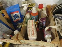all misc garage items on shelf glues more