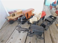 4 Cast Iron trucks, 1 horse and buggy