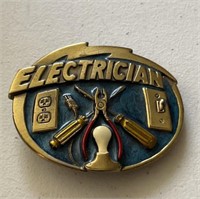 NOS 1982 Electrician brass belt buckle