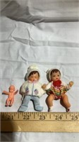 3 mini dolls