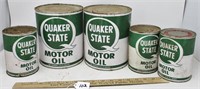 5 - Full Quaker State oil cans