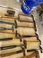 13 hammers and an ax  and blue Lowes bucket