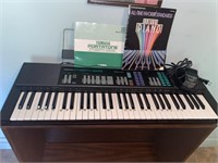 Yamaha portatone piano with instruction & song