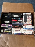 Large lot of VHS TAPES in box