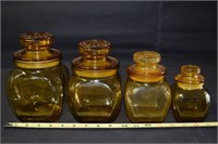 Vintage 4-piece Amber Glass Lidded Canister Set