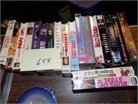 VHS tapes with 3 that are factory sealed