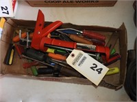 Box of tools including screw drivers & caulk gun