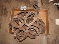 Box of horse shoes & spur straps