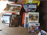 (2) boxes of puzzles