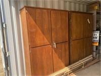 2 wooden storage cabinets w/ trim