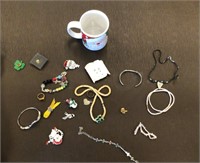 coffee cup w jewelry contents
