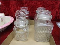 (4)Glass canisters w/lids.