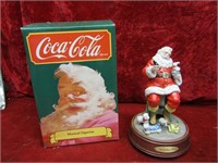 Musical coca Cola Santa figure.