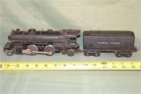 Lionel O Scale 1654 2-4-2 steam locomotive with te