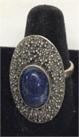 Sterling silver ring, with oval blue stone