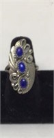Custom made sterling silver ring with blue stones