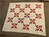 Antique red and white quilt
